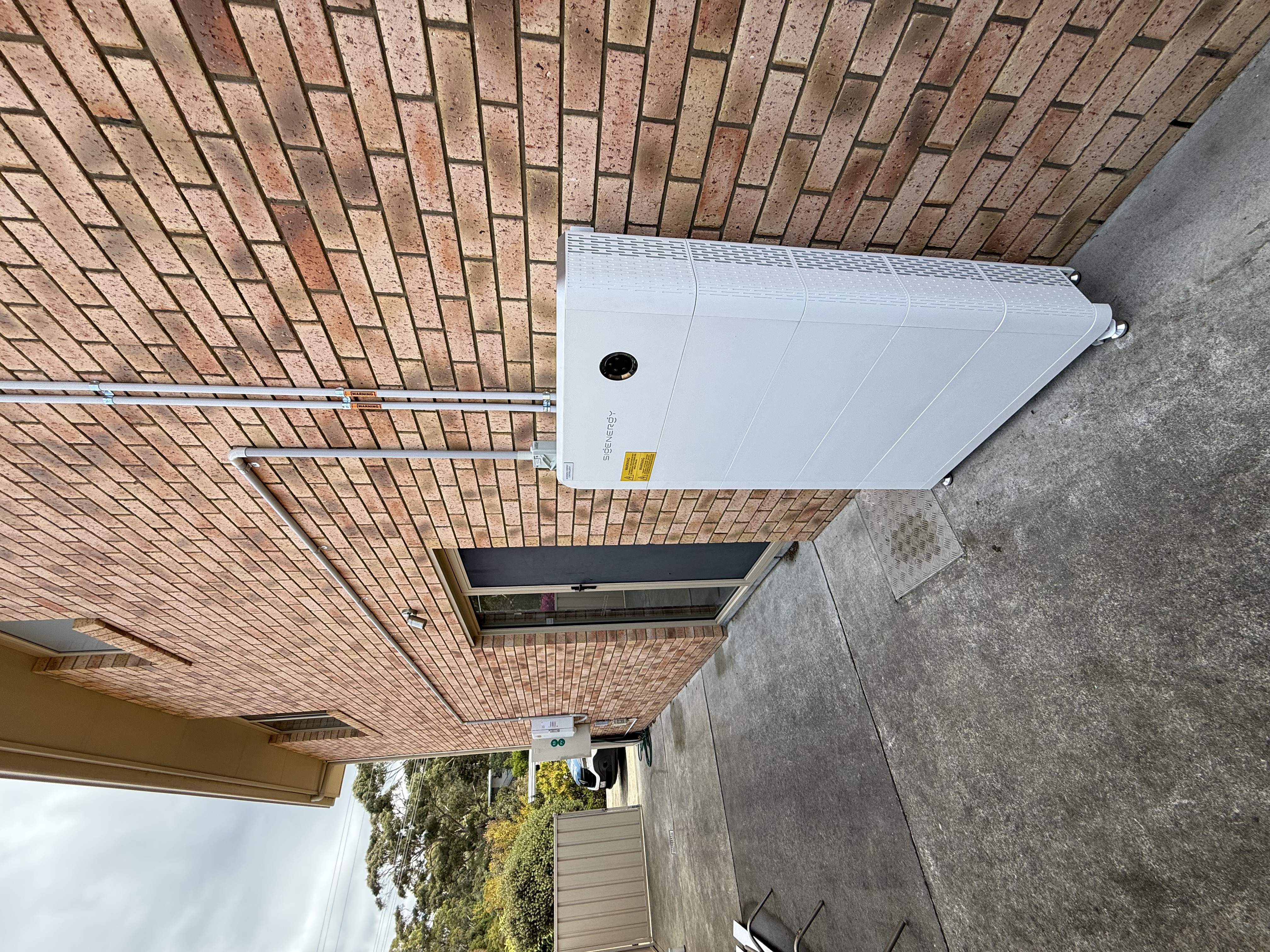 Battery storage system and gateway on brick exterior